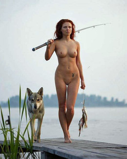 Nude busty babes catch a big fish on the